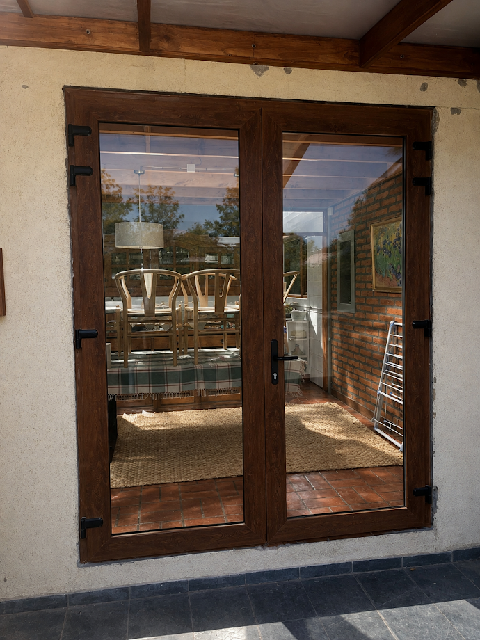 Proyecto de puerta doble con termopanel EcoGreen